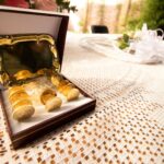 an open box of gold nuggets sitting on a table